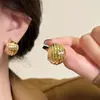 Pendientes de textura europea y americana con patrón de media caña y textura irregular martillada para mujer, modernos, sencillos, de alta gama, joyería para orejas, venta al por mayor transfronteriza