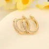 Hebilla de Oreja de Zirconia Europea y Americana Transfronteriza, Lujo Ligero, Sentido de Alta Gama, Anillo de Hueso de Oreja Simple de Círculo de Cobre Plateado, Pendientes para Mujer