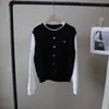 [Bizheng] Otoño 2025 Nuevo Estilo Coreano de Gama Alta Patchwork de Color Contrastante Suéter de Manga Larga Falso de Dos Piezas Cuello Redondo para Mujer 5088