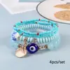 Joyería Nueva y Elegante para Mujer de Venta Caliente Transfronteriza Colgante Multicolor Ojo del Diablo Concha Pulsera Elástica Multicapa de Moda