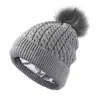 Gorro de punto cálido con pompón de color europeo y americano, giro de diamante, nuevo para invierno, gorro de lana nuevo para mujer
