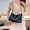 Otoño 2026 Nuevo Color Sólido Elegante Moda Diseño de Nicho Simple para Viajes Diarios Bolso de Axila Bolso Cruzado de Hombro Único para Mujer