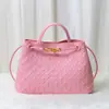 Bolso tote de diseño de nicho de moda, nudo metálico, tejido de cuero, hombro, portátil, gran capacidad, piel de vaca, bolso para mujer