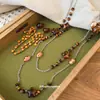 Aretes y Collar Maillard Vintage de Madera con Perlas de Cristal y Cadena para Suéter de Diseño de Nicho de Lujo Ligero, Juego de Joyería de Otoño e Invierno