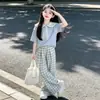 Hermoso Conjunto Escolar Coreano para Niñas Modelo Nuevo 2026 para Niños Mayores y Estudiantes de Secundaria Conjunto de Verano Azul Marino con Cuello y Pantalones de Manga Corta