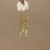 Pendientes Largos Dorados Huecos con Borlas 2025 Nuevos Más Vendidos Pendientes de Gama Alta con un Toque de Lujo para Mujeres con Rostro Cuadrado o Redondo