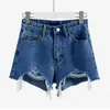 Pantalones Cortos de Mezclilla de Cintura Alta para Primavera y Verano Estudiantes Femeninas Nueva Llegada Rasgados Combinan con Todo Borde Crudo Ajustados Estilo Coreano Pantalones de Pierna Ancha Pantalones Calientes de Moda