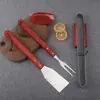 Traje combinado de herramientas para hornear de tres piezas Producto de Amazon acero inoxidable mango de madera tenedor pala pinza herramienta para barbacoa suministro directo