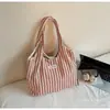Bolsa Tote Artística para Mulheres 2026 Nova Bolsa de Ombro Listrada de Verão Grande Capacidade para o Dia a Dia Casual Bolsa de Lona