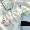 Nuevo accesorio de cadena para teléfono con lazo de cuentas de cristal de celebridad de internet, sección corta, colgante para teléfono, colgante anti-pérdida para teléfono, colgante para bolso