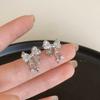 Pendientes de lazo de circonita ultrabrillantes, diseño de nicho femenino, pendientes de alta gama, temperamento de moda, pendientes rojos de red al por mayor
