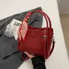 Bolso de mano de seda a la moda para mujer, nuevo y elegante bolso tote tipo cubo vintage con un toque de alta gama, bolso cruzado de gran capacidad, diseño simple