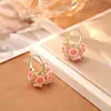 Aretes tipo ear cuff y aretes color rosa dopamina para mujer, nuevo modelo 2026, sensación de lujo ligero y alta gama, extremadamente hermosos y únicos