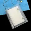 Cuaderno de hojas sueltas tamaño A7 con cierre de doble botón y anillas, cubierta simple para cuaderno