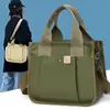 Bolso Tote Estilo Japonés Transfronterizo 2023 Nuevo Bolso de Lona Bolso de Almuerzo para Mujer Bolso de Mano Cruzado Casual Más Fácil de Combinar Bolso para Viajar al Trabajo