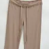 Venta al por mayor de ropa para mujer estilo europeo y americano transfronteriza INS, nuevos pantalones acampanados elásticos de otoño de cintura alta con cordones y costuras visibles