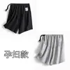 Shorts de Suporte para Gestante Tricotados Cinco Pontos Estilo Reto Solto Esconde Imperfeições Fica Slim Decoração com Logo Pequeno Shorts Outerwear para Gravidez