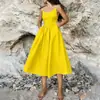Ropa europea y americana de mujer transfronteriza 2026: elegante vestido largo, sexy vestido de estilo vacacional con tiras en la espalda y escote pronunciado