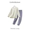 Conjunto de pijama infantil unissex de cor sólida com mangas compridas, roupa de casa fina com gola redonda, conjunto de duas peças respirável para crianças mais velhas