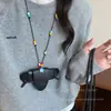 Colar Longo Magnético de Óculos de Sol e Clipe para Fone de Ouvido com Cordão para Pendurar no Pescoço para Mulheres 2026 Novo Modelo Portátil para Viagem ao Ar Livre