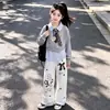 Versátil estilo universitario para niñas, nueva colección primavera y otoño 2026: conjunto de top con cuello y encaje y pantalones casuales de pierna ancha
