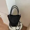Bolso Shuai Mi Jia, color liso, elegante, nuevo modelo 2026, bolso de hombro casual, bolso de axila de moda, bolso cubo tejido para el día a día