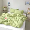 Estilo INS color sólido algodón puro algodón lavado artículo individual funda de edredón funda de edredón 100% algodón juego de tres piezas estudiante doble juego de tres piezas ropa de cama