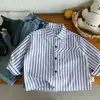 Camisas Infantis Bangcheng 2026 Outono Novo Camisas Listradas com Estampa de Desenho para Meninos Atacado de Roupas Infantis Huzhou Zhili