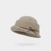 Al por mayor 25 Años Otoño e Invierno Nuevo Sombrero de Lana Camelia Estilo Hepburn Francés para Mujer Sombrero de Pescador con Forma Elegante