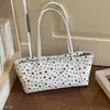 Moderna y versátil nueva bolsa de axila 2026, gran capacidad, diseño de estrella, estilo coreano de otoño, con colgante, bolso de mano y bolso de hombro para el uso diario de mujeres