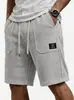 2026 Novos Shorts de Praia Estilo Europeu e Americano para Homens, Corte Solto com Cordão Elástico, Shorts de Cinco Pontos com Etiqueta e Múltiplos Bolsos