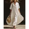 Sitio independiente transfronterizo 2026 estilo europeo y americano nuevo verano color liso casual holgado playa vacaciones largo cuello en V vestido de mujer