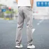 Calças Casuais de Outono Masculinas Retas Largas Elásticas Longas 2026 Nova Marca Tendência Versátil Cinza Calças Esportivas Masculinas