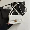 Bolso pequeño cuadrado tejido 2026 nuevo bolso de hombro de moda bolso simple para mujer bolso de mano pequeño bolso de mujer de comercio exterior bolso cruzado