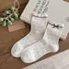 Calcetines de lunares con lazo para mujer, calcetines de media pantorrilla para primavera y otoño, calcetines de encaje superpuestos, calcetines largos versátiles sin costuras a rayas azules y marrones