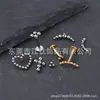 Jiangtai F136 Aleación de Titanio Joyería Cabeza Corazón Cruz Media Luna Bola Cruz Joyería para Piercing de Titanio G23 Pendientes