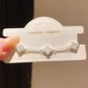 Pulsera de flor de zirconia clara y brillante, sensación de lujo ligero y alta gama, elegante y versátil para el uso diario