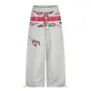 Estilo callejero americano, diseño invertido, estampado de bandera, dobladillo curvo, ajuste holgado unisex, pantalones de chándal anchos y fluidos para street dance