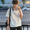 Camisa polo de manga corta a cuadros grises con retazos para hombre, estilo casual americano de verano, corte limpio, camiseta de hombro normal