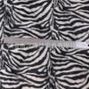 Liquidación de stock tela de felpa corta estampada con manchas leopardo Tigre cebra animal de granja imitación tela para mascotas