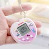 Máquina electrónica de mascotas mini de mano más vendida, máquina de juego de mascotas virtuales, llavero, colgante de regalo pequeño creativo