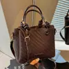 Bolso pequeño tejido de moda transfronterizo para mujer, nuevo bolso cubo versátil de moda retro 2026, bolso de hombro y bandolera