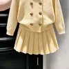 Conjunto de punto nuevo para otoño 2026 estilo coreano para niñas, cárdigan suéter elegante y falda plisada para bebé niña