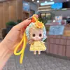 Diadema de Girasol con Pelo Rizado Lindo Colgante Llavero de Muñeco de Dibujos Animados para Coche Figura Decoración de Bolsa Colgante