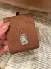 Collar Puerta Francesa de la Felicidad para Mujer Colgante de Castillo de Diamantes Completos Jaula de Pájaros Botella de Perfume Clavícula Lujo Ligero Estilo de Nicho de Gama Alta