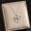 Colar Transfronteiriço de Aço Titânio para Mãe e Filha, Design Infinito de Amor com Pingente Cravejado de Diamantes, Joia Versátil para Clavícula