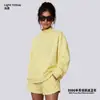 Conjunto de ropa europea y americana para mujer transfronterizo: sudadera casual y shorts, sudadera holgada de forro polar color liso, cuello medio alto, estilo 'dopamine hot girl'