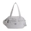 Bolsa de Grande Capacidade para Mulheres 2026 Nova Moda Casual Estilo Fresco Bolsa de Ombro Leve para Viagem de Curta Distância Bolsa Transversal