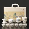 Conjunto de chá de porcelana branca com design de paisagem azul e branca, caixa de presente para uso doméstico, conjunto de chá kung fu, presente corporativo