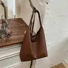 Bolsa Feminina 2026 Novo Estilo Bolsa para Trabalho e Deslocamento Sensação de Alto Padrão Bolsa de Ombro Tecida Bolsa de Ombro Tendência Retrô Transfronteiriça